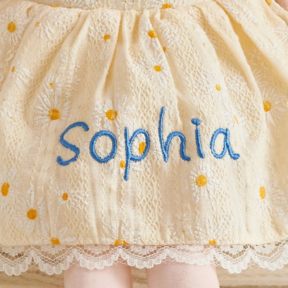 Daisy Girl plush doll with custom embroidered name detail on dress