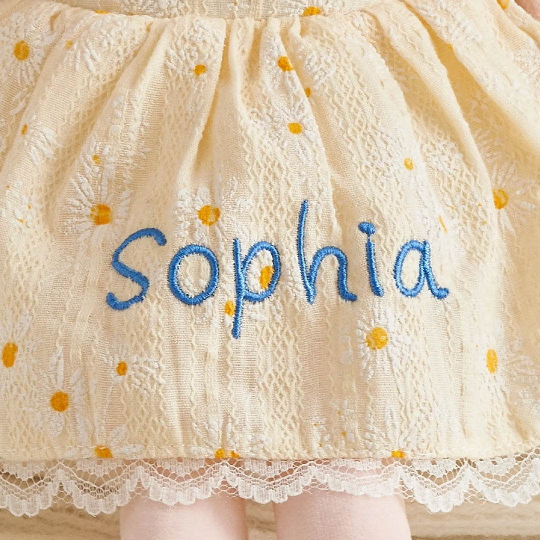 Daisy Girl plush doll with custom embroidered name detail on dress