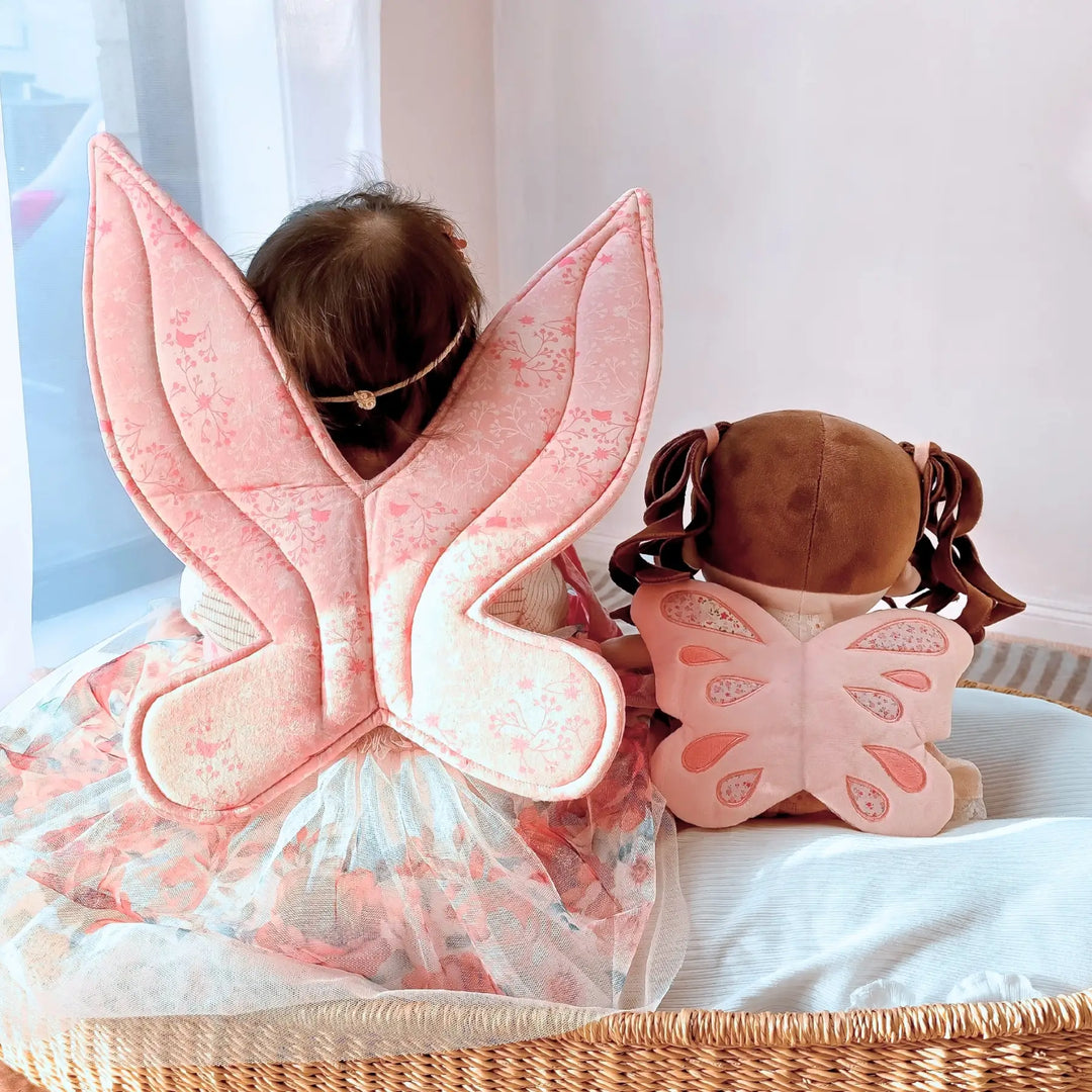 Baby Girl and Maisie Butterfly plush doll showing matching butterfly wings